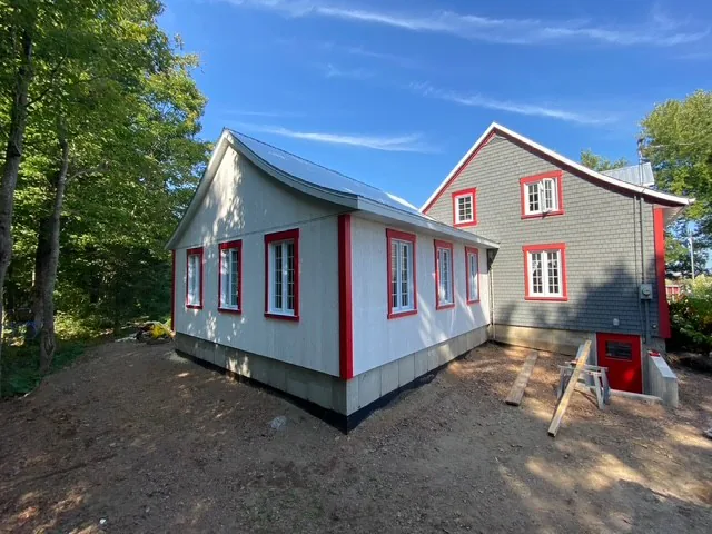 Agrandissement d'une maison, galerie et rampe